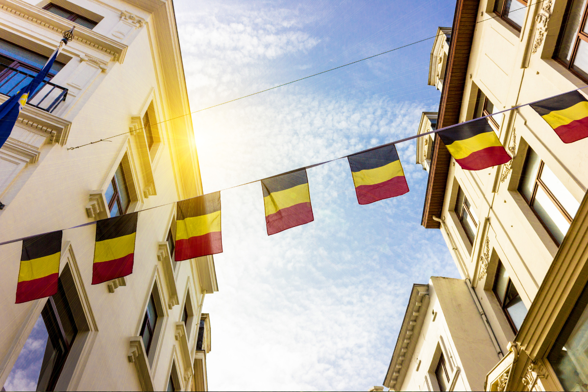Belgium flags hanging between two buildings